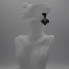 Boucle triangulaire en or noir